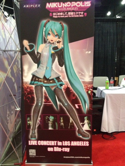 MIKUNOPOLIS banner at Aniplex USA booth